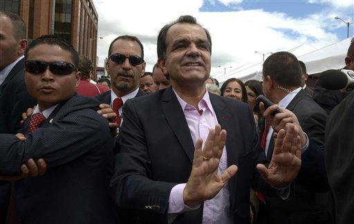 Santos re-elected Colombia president in peace vote