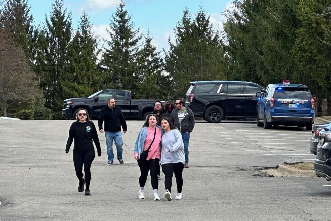 The Latest: Man fatally shot attacking Michigan synagogue