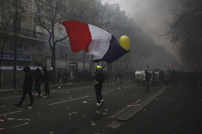 Paris police use tear gas amid strike over pension reform