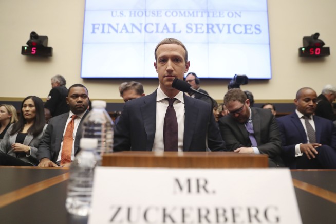 The Latest: Congressman compares Facebook CEO to president