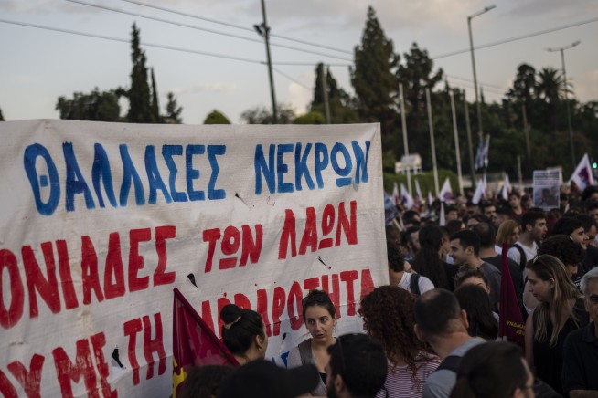 Hope dims for missing migrants amid questions about Greece's actions in deadly sinking