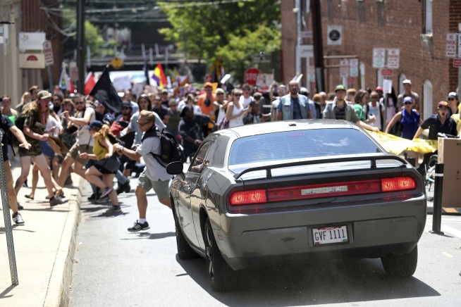 Officials: White nationalist rally linked to 3 deaths