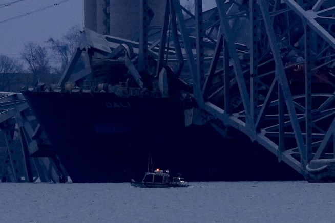 Baltimore bridge collapses after powerless cargo ship rams into support column; 6 presumed dead