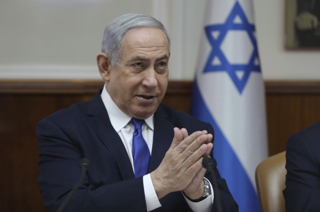 Israel PM seeks immunity, buying time until after vote