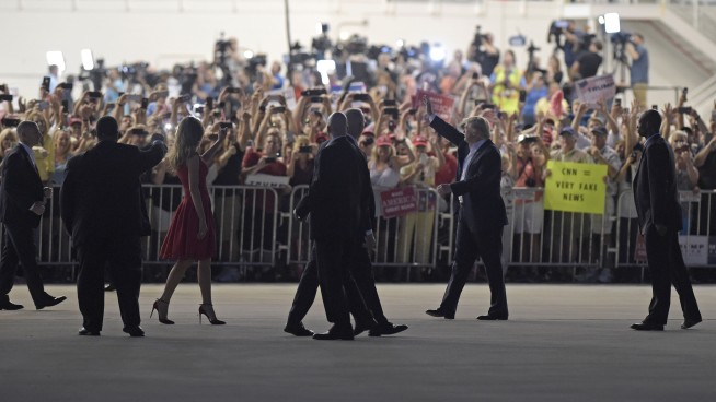 Trump rallies supporters by renewing old promises, insults