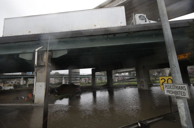 Mudslide sweeps house off hill as storm pounds California
