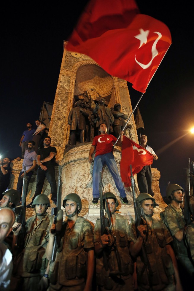 The Latest: Pro-govt rally held as Turkish lawmakers meet