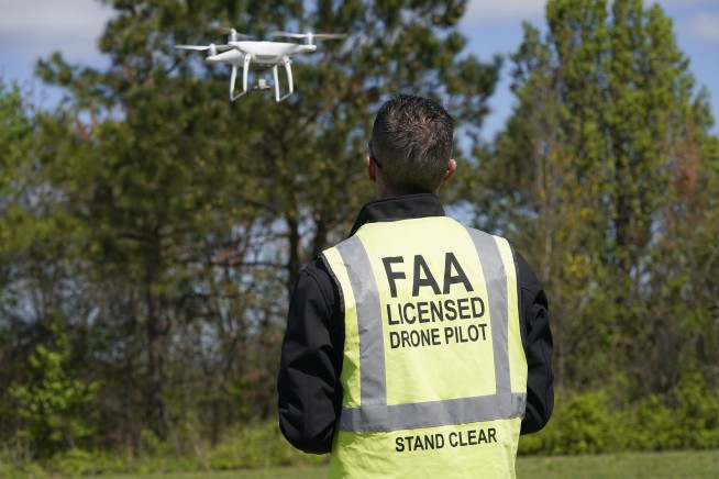 Drone operators challenge surveyors' turf in mapping dispute