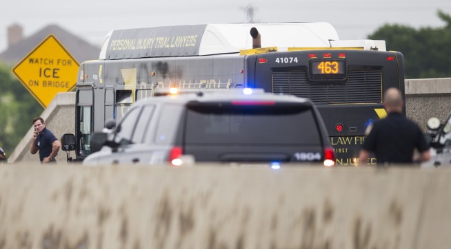 Official: Police kill gunman who hijacked Dallas-area bus