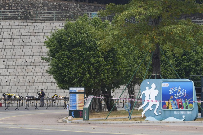 Driver rams his car into crowd in China, killing 35. Police say he was upset about his divorce