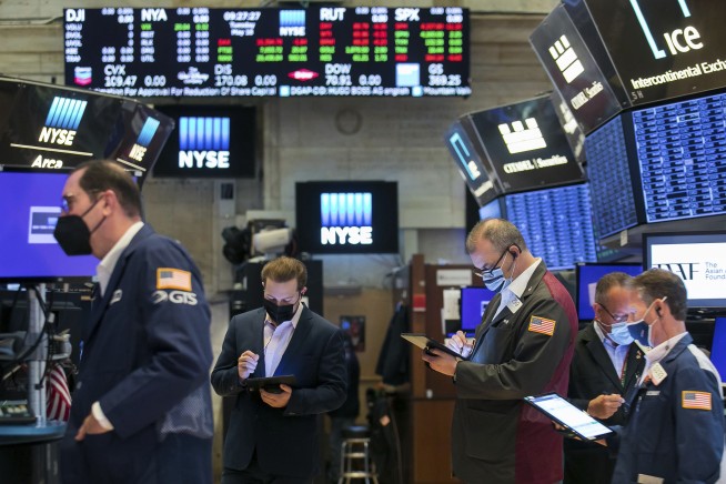A late drop leaves Wall Street indexes lower, led by tech