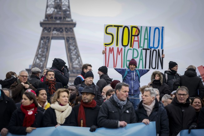 French protesters ask Macron not to sign off on an immigration law with a far-right footprint