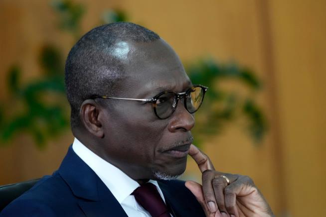 Benin's president condemns a foiled coup bid and says mutineers are 'fleeing'