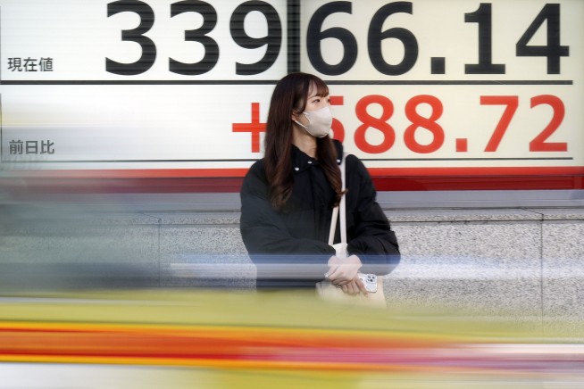 Stock market today: Asian shares advance following Wall Street rally led by technology stocks