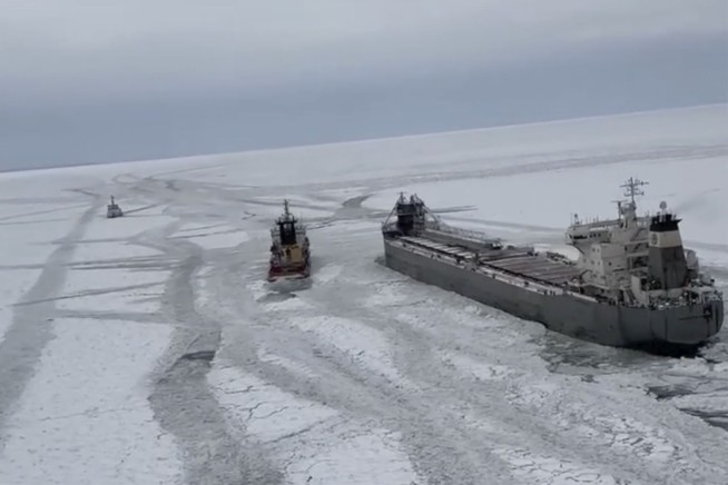 Freighter on the move after it was freed from ice on frozen Lake Erie