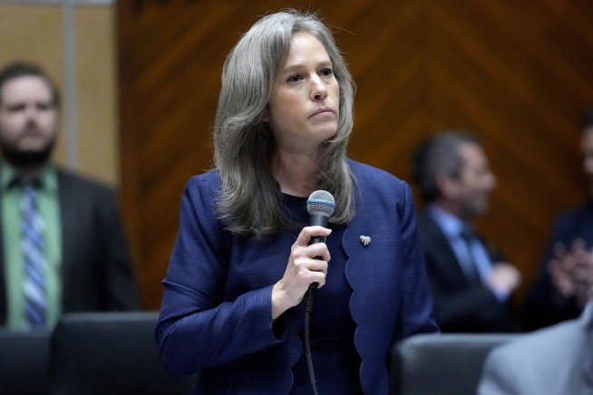 Arizona's Democratic governor signs a bill to repeal 1864 ban on most abortions