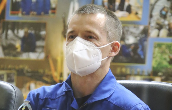 Russian-US crew welcomed aboard the space station