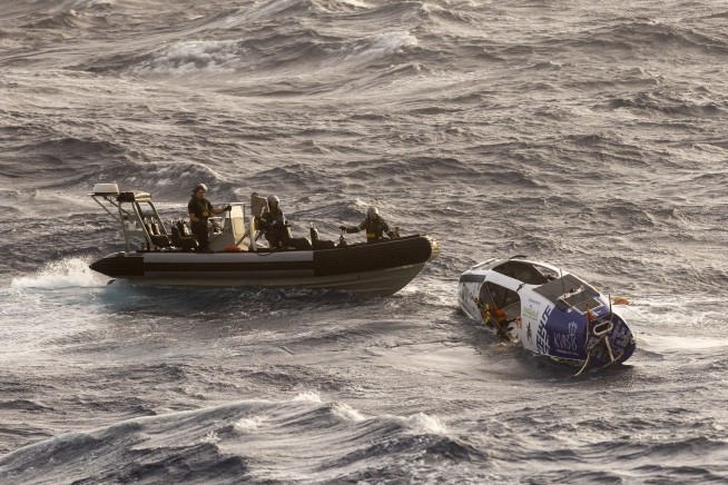 Australian navy rescues adventurer who hit a cyclone while rowing across the Pacific Ocean