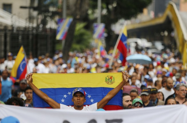 The Latest: US says Maduro should go; recognizes new leader