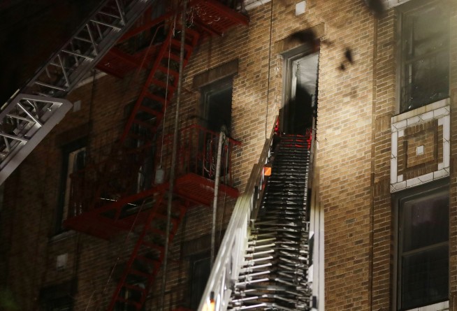New York City fire kills 12, sends residents scrambling