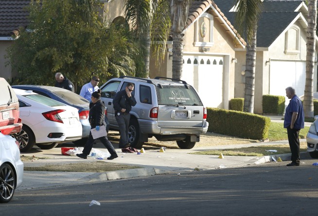 Police search for suspects in California shooting; 4 killed