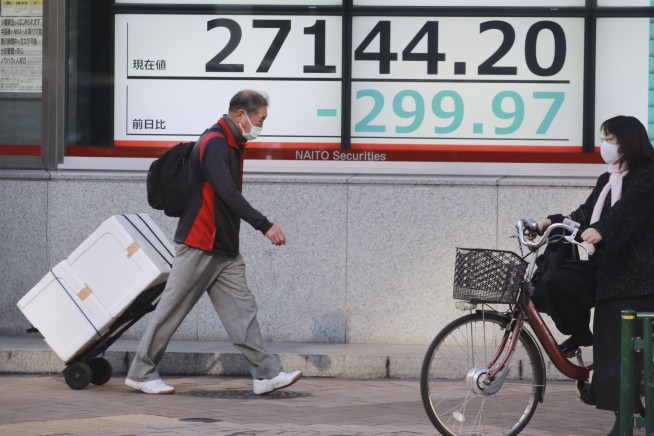 Stocks fall as trading starts for year of great expectations