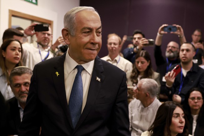 Israel's Netanyahu vows to challenge 'absurd' corruption charges as he takes the stand in his trial