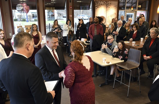 Couple return for a 2nd dunk at Dunkin', this time with vows