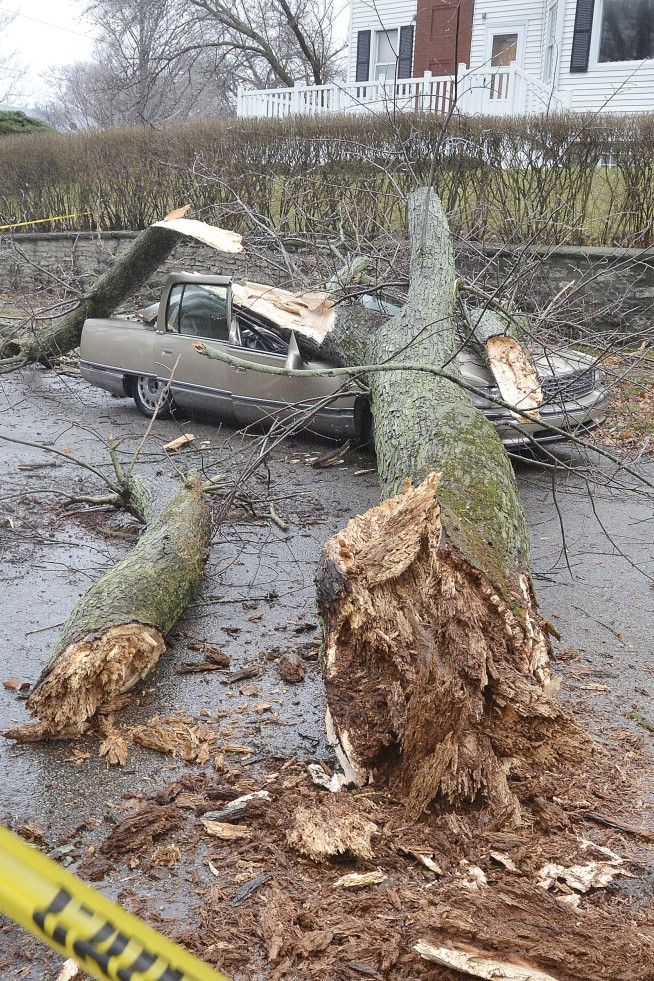 Large storm brings twisters, floods, now snow and ice
