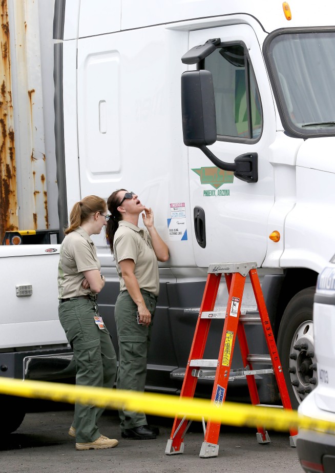 Arizona police are questioning 2 people in freeway shootings