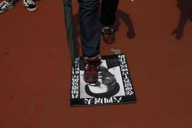 Hong Kong police fire tear gas after protesters defy ban