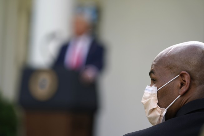 Biden knocks Trump for 'this macho stuff' in shunning masks