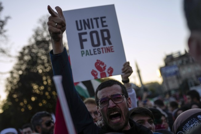 Gaza's desperate civilians flee or huddle in hopes of safety, as warnings of Israeli offensive mount