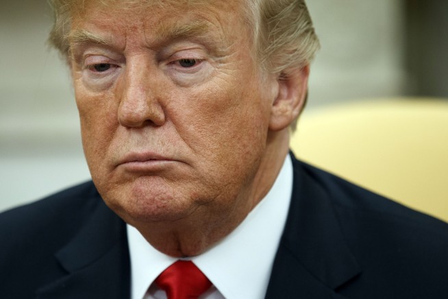 Trump delays proposed Putin meeting until 2019