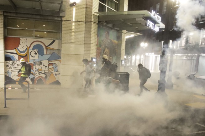 Police and protesters clash in violent weekend across the US