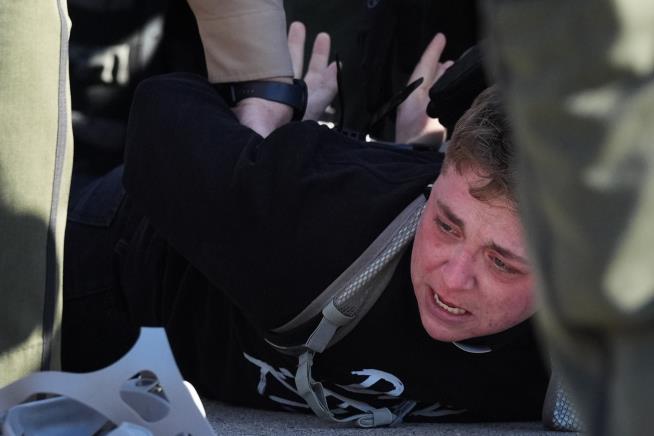 Protesters arrested, officers injured in clash outside Chicago-area immigration facility