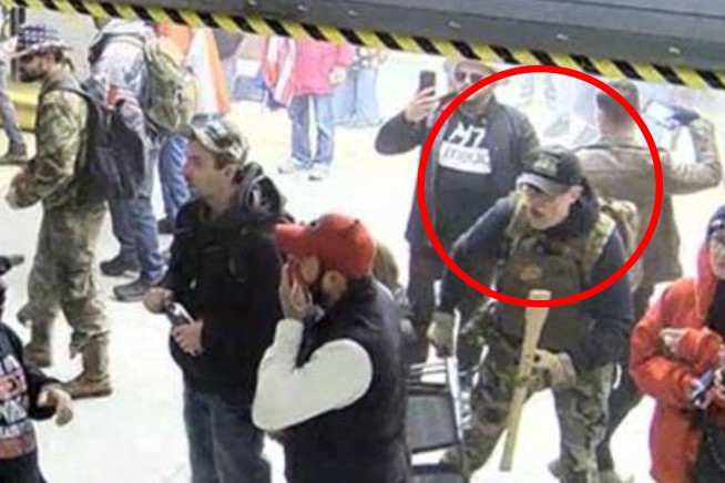 A Proud Boys member who wielded an axe handle during the Capitol riot gets over 4 years in prison