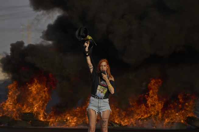 Israeli military says strikes on Gaza hospital targeted a Hamas camera, without providing evidence