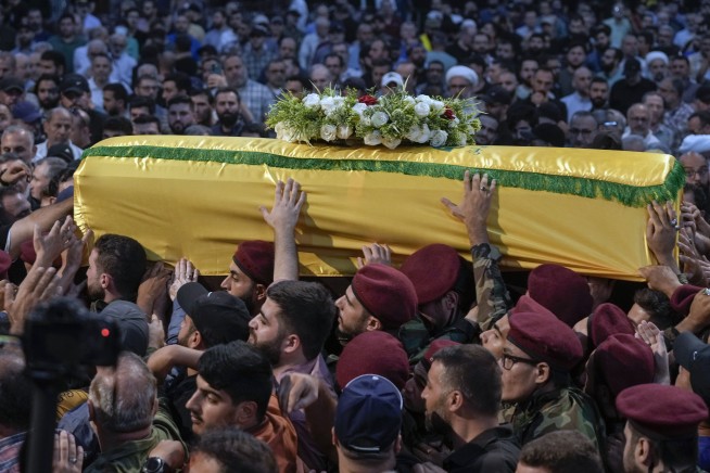 Hezbollah fires over 200 rockets into Israel after killing of senior commander