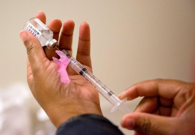Flu season surged in the US over the holiday and already rivals last winter's harsh epidemic