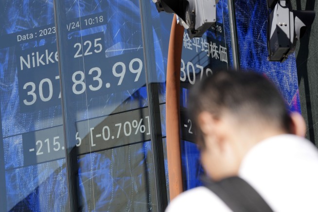 Stock market today: Asian shares mixed after US stocks wobble as US Treasury bond yields veer
