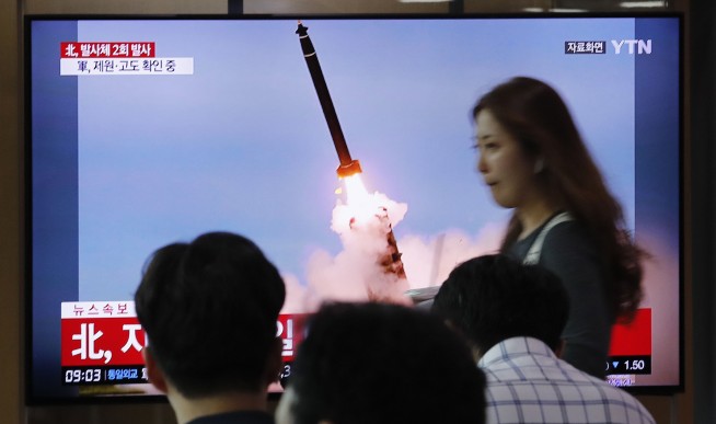 North Korea fires 2 projectiles after offering talks with US