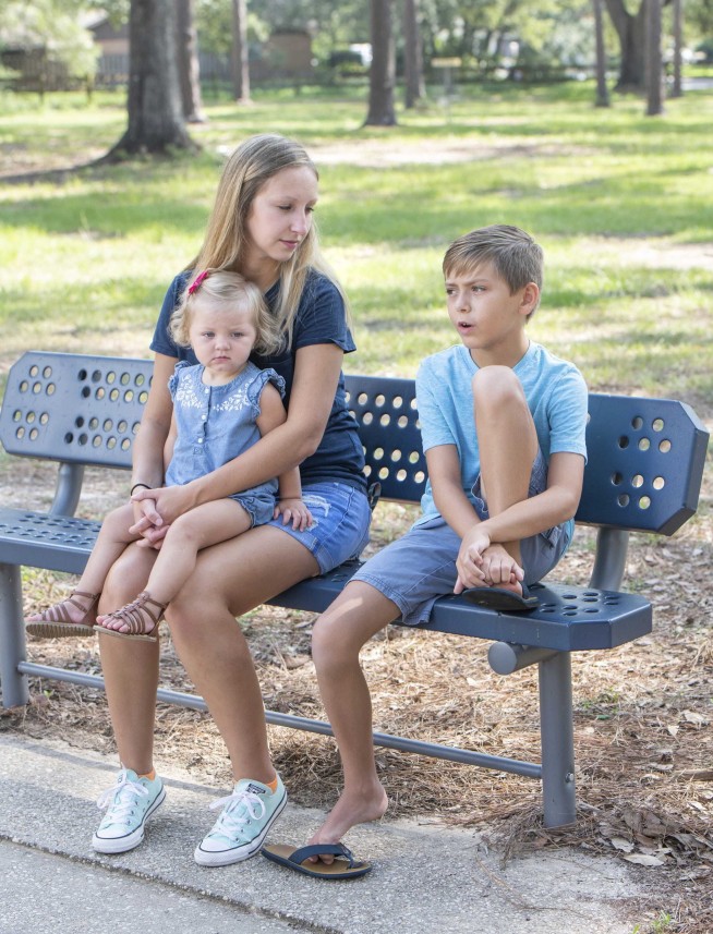 Man fractures neck in diving accident; young son saves him