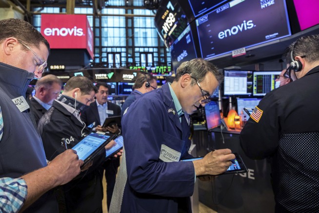 Stocks fall on Wall Street as tech slips, bond yields jump