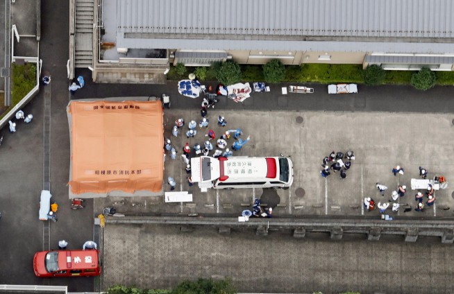 The Latest: Hearses arrive at site of Japan knife attack