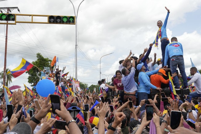 Venezuela opposition leader provides hope for many, even though she isn't on the presidential ballot