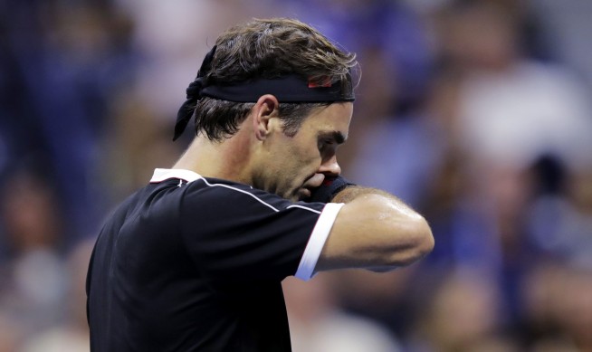 Bothered by back, Federer loses US Open QF to 'Baby Fed'