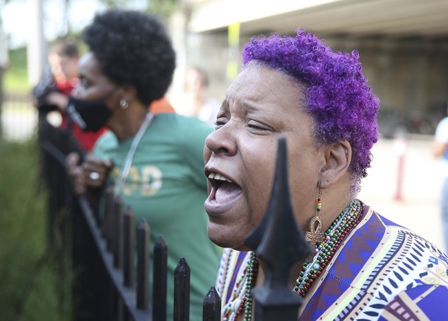 19 bodies reburied amid protests in search for Tulsa victims