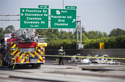 Small plane crashes into busy Atlanta interstate; 4 killed