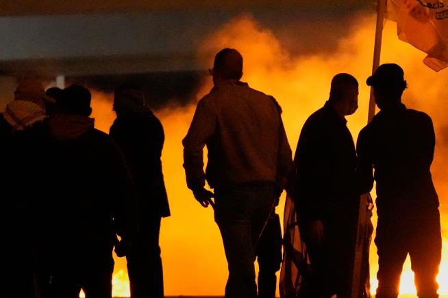 Calls for peace and flashes of anger after US and Israeli attacks kill Iran's Khamenei